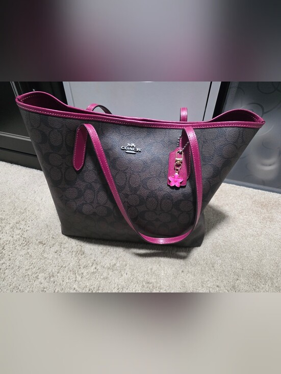 Coach Handbags - Coach Brown Signature Tote with Pink Trim and Charm